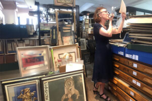 Liz Conor examining an document